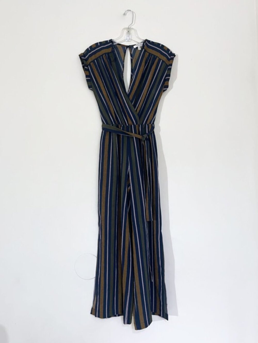 Monteau. Striped sleeveless v neck jumpsuit with slits and belt